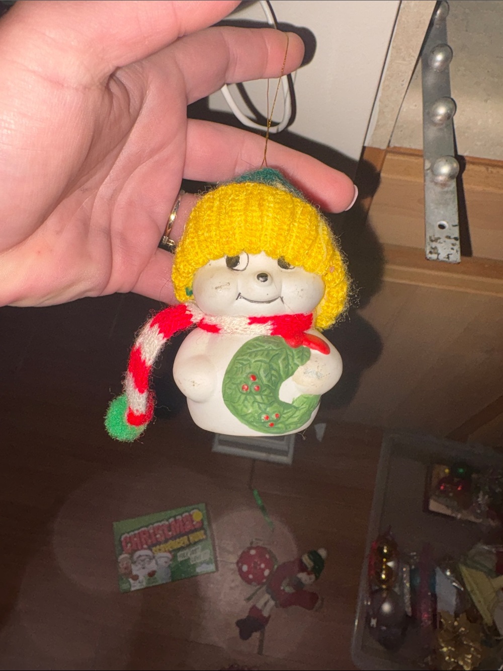 Handheld Snowman Bell Ornament with Yellow Hat and Red-White Scarf